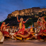 Folk dancers performing at Marwar Festival in front of Mehrangarh Fort